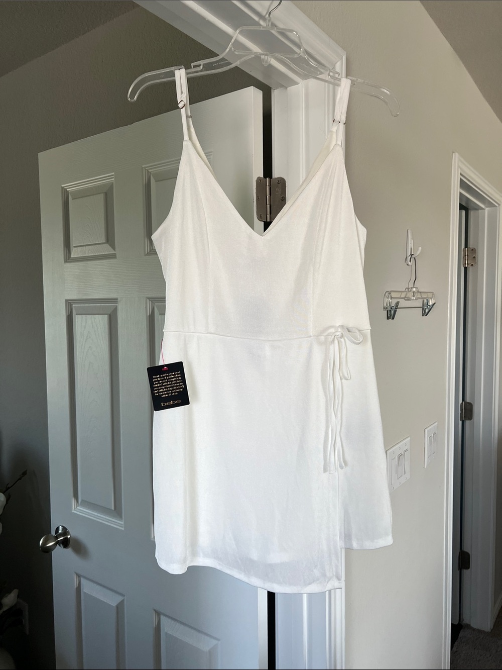 bebe Wrap Skirt Romper in Coconut Milk- NWT